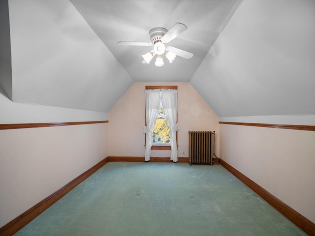218 S Broadway St, Tekoa, WA 99033 - additional living space with radiator heating unit, carpet, vaulted ceiling, and a ceiling fan