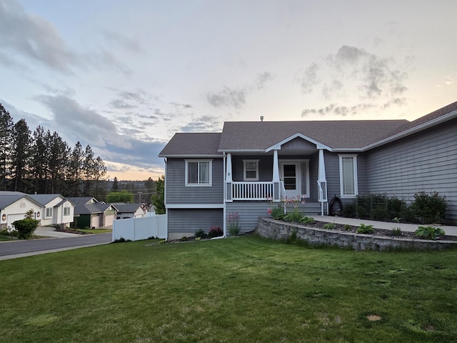 6805 Royal Ln, Spokane, WA 99208 - view of front of home with covered porch and a front lawn