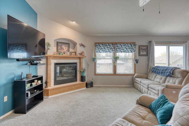 6805 Royal Ln, Spokane, WA 99208 - carpeted living area with baseboards and a tile fireplace