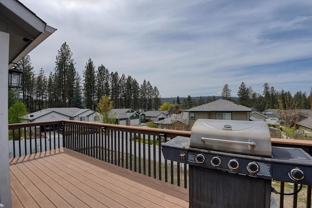 6805 Royal Ln, Spokane, WA 99208 - wooden deck with a residential view and a grill