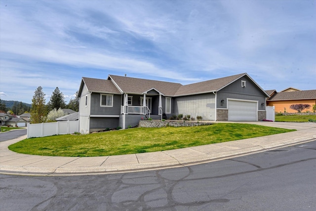 6805 Royal Ln, Spokane, WA 99208 - ranch-style house with a garage, a porch, and concrete driveway