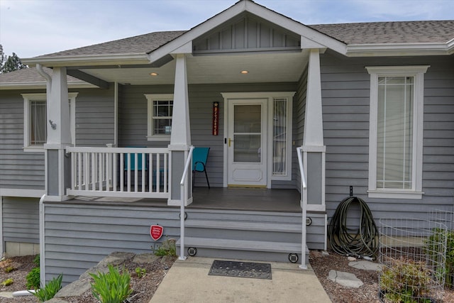 6805 Royal Ln, Spokane, WA 99208 - entrance to property featuring covered porch and a shingled roof