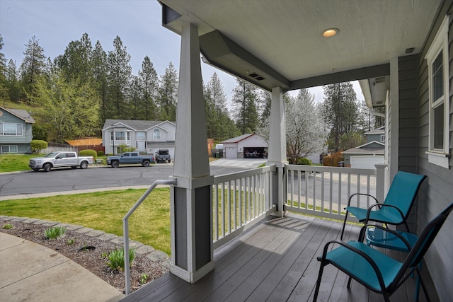 6805 Royal Ln, Spokane, WA 99208 - wooden porch with a lawn and a residential view