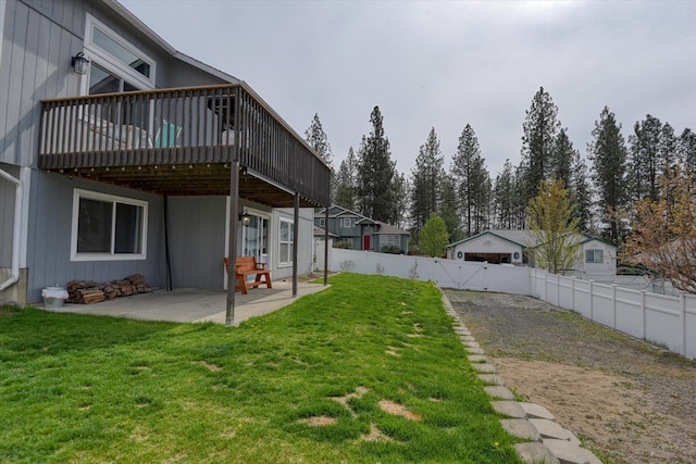 6805 Royal Ln, Spokane, WA 99208 - view of yard featuring a patio area, a deck, and a gate
