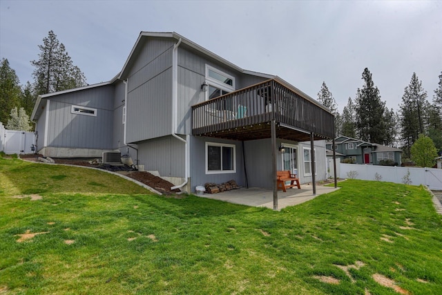 6805 Royal Ln, Spokane, WA 99208 - rear view of property featuring a gate, a wooden deck, a patio area, and central AC unit