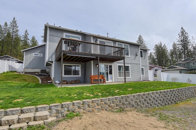 6805 Royal Ln, Spokane, WA 99208 - rear view of house with a wooden deck, a patio, and central AC