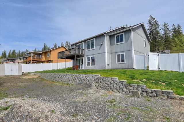 6805 Royal Ln, Spokane, WA 99208 - back of house with a deck and a gate
