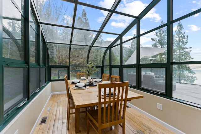 sunroom featuring visible vents