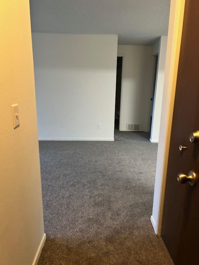 2514 E Casper Dr, Spokane, WA 99223 - empty room with carpet floors, baseboards, and visible vents