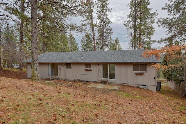 2514 E Casper Dr, Spokane, WA 99223 - back of house featuring fence, central AC unit, and a shingled roof