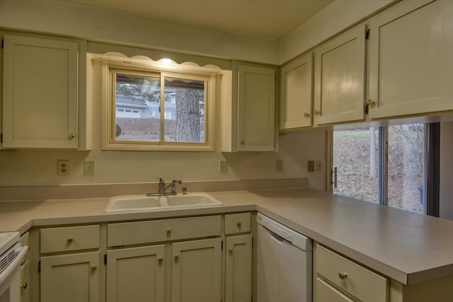 2514 E Casper Dr, Spokane, WA 99223 - kitchen with light countertops, a wealth of natural light, a sink, and dishwasher