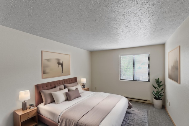 carpeted bedroom with a textured ceiling and baseboard heating