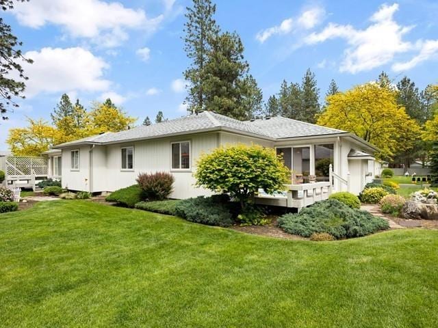 8409 N Pine Meadows Ln, Nine Mile Falls, WA 99026 - rear view of property with a lawn