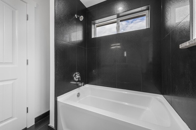 full bathroom with tub / shower combination