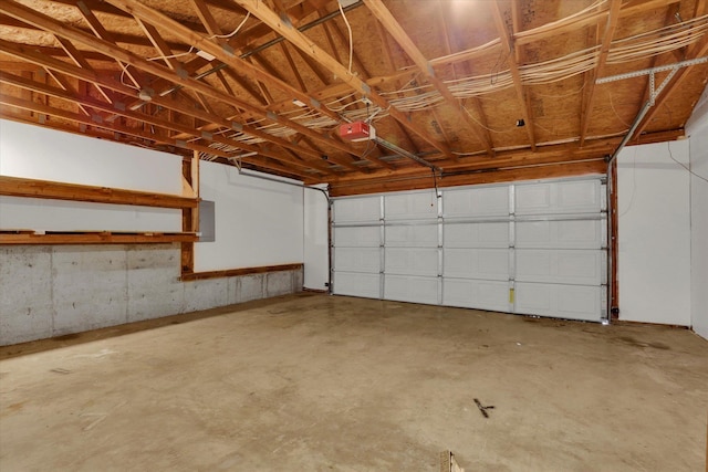 129 E Wynot Dr, Nine Mile Falls, WA 99026 - garage with a garage door opener and electric panel
