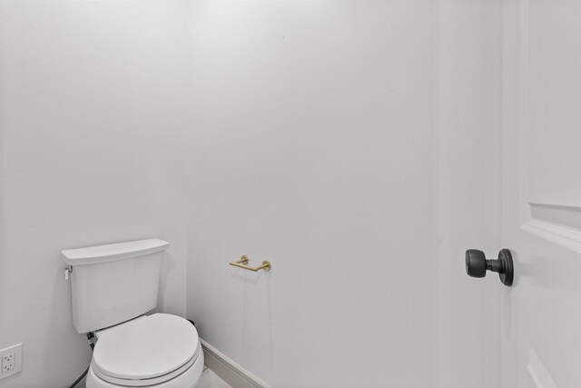 bathroom featuring toilet