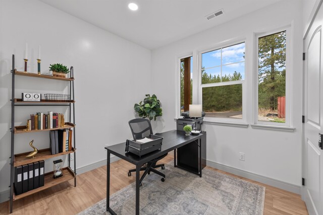 office area featuring visible vents, recessed lighting, light wood finished floors, and baseboards