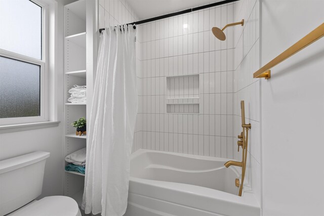 full bath featuring toilet and shower / tub combo