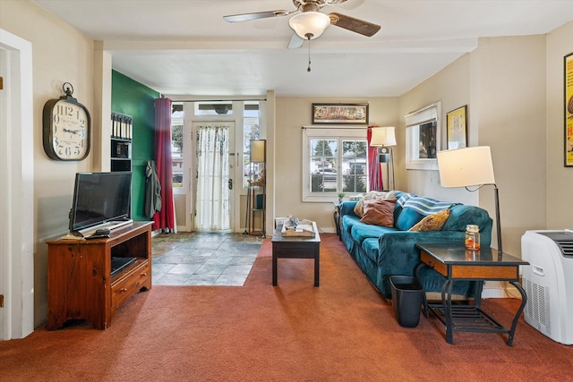 3314 E 29th Ave, Spokane, WA 99223 - living area with carpet floors, a ceiling fan, baseboards, and a healthy amount of sunlight