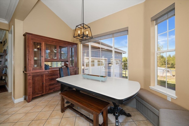 22828 S Gateway Ln, Cheney, WA 99004 - dining space with a chandelier, lofted ceiling, light tile patterned floors, and a wealth of natural light
