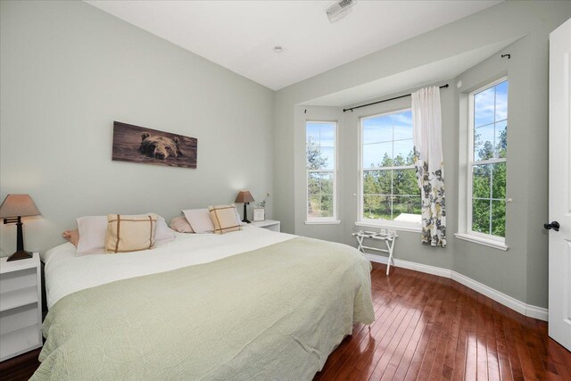 22828 S Gateway Ln, Cheney, WA 99004 - bedroom with baseboards, dark wood-style floors, and visible vents