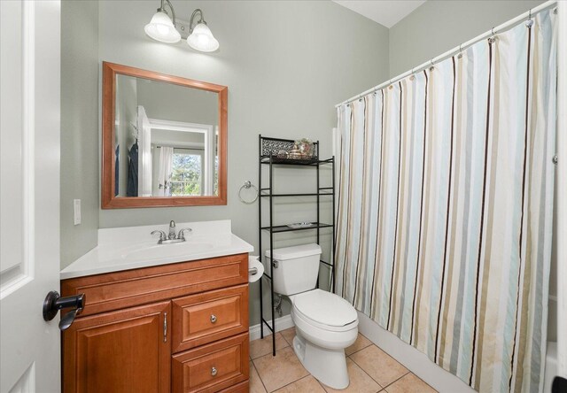 22828 S Gateway Ln, Cheney, WA 99004 - bathroom with toilet, tile patterned floors, and vanity