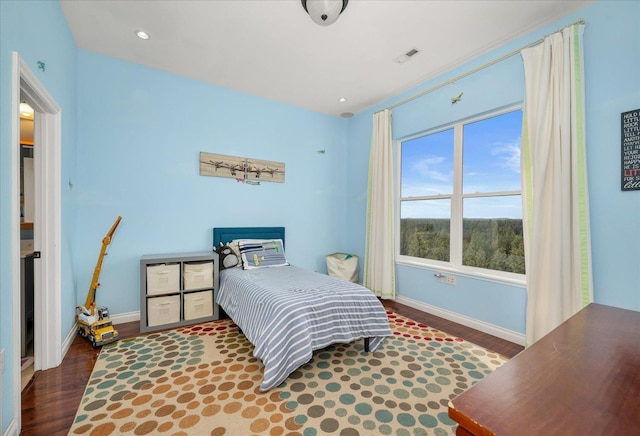 22828 S Gateway Ln, Cheney, WA 99004 - bedroom featuring baseboards, wood finished floors, and visible vents