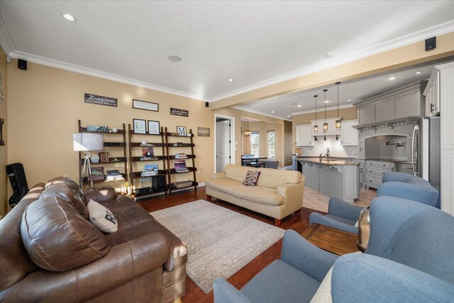 22828 S Gateway Ln, Cheney, WA 99004 - living room with crown molding, recessed lighting, and wood finished floors