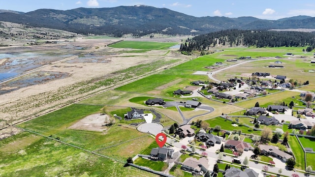 bird's eye view with a mountain view