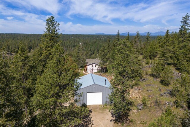 drone / aerial view with a forest view