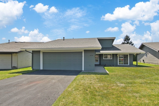 2834 S Pittsburg Street 2834S. Pittsburg St., Spokane, WA 99203 - view of front of home with a garage, a front lawn, aphalt driveway, and roof with shingles