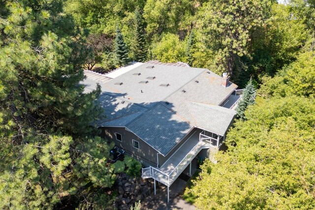 bird's eye view with a forest view