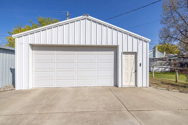 detached garage with fence
