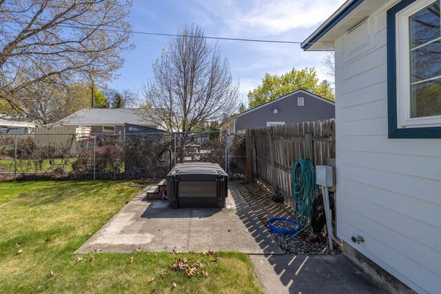 view of yard with fence and a patio area