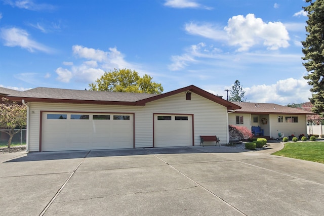 view of front of home featuring driveway and a garage