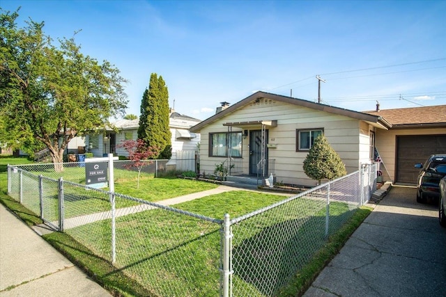 bungalow-style house featuring an attached garage, concrete driveway, fence private yard, and a front yard