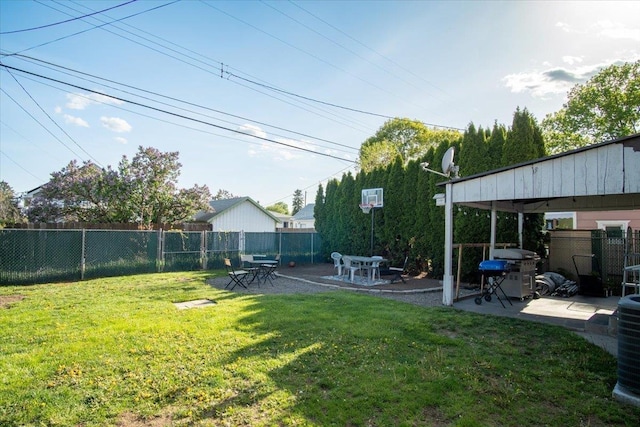 view of yard with central air condition unit, a patio, and a fenced backyard