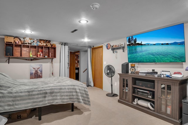 bedroom with carpet, recessed lighting, and visible vents