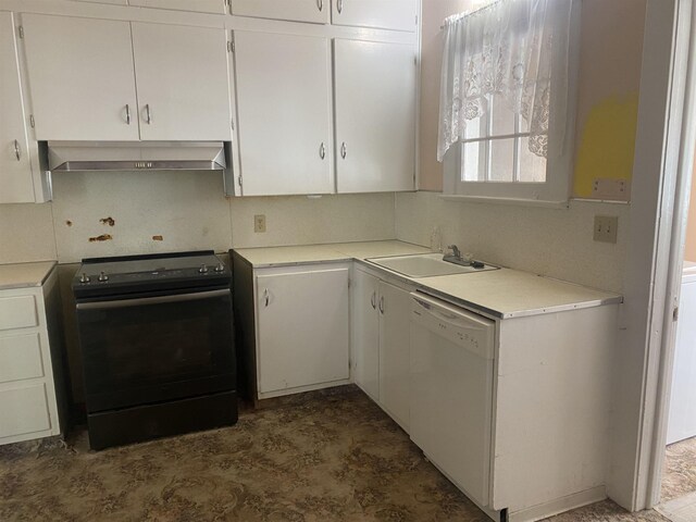 kitchen featuring dishwasher, a sink, white cabinets, black range with electric cooktop, and wall chimney exhaust hood