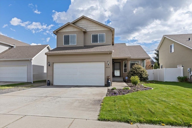14316 E 31st Ln, Veradale, WA 99037 - view of front of home featuring a garage, a front lawn, fence, and concrete driveway