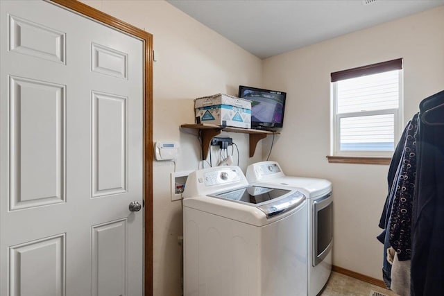 14316 E 31st Ln, Veradale, WA 99037 - laundry area featuring separate washer and dryer, baseboards, and laundry area