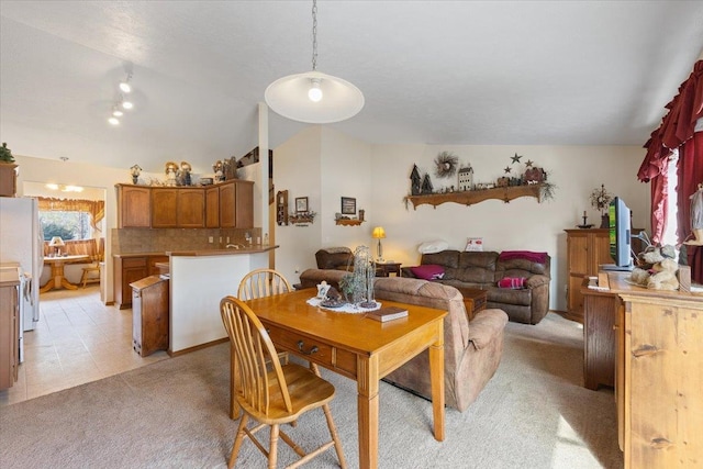 14316 E 31st Ln, Veradale, WA 99037 - dining room featuring vaulted ceiling and light carpet