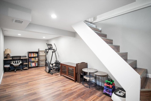 interior space featuring visible vents, recessed lighting, and wood finished floors