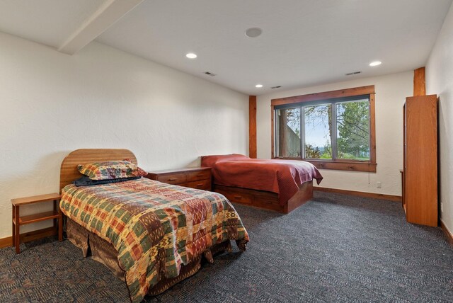 carpeted bedroom featuring recessed lighting, baseboards, and visible vents