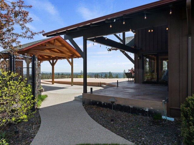 exterior space with a deck and fence