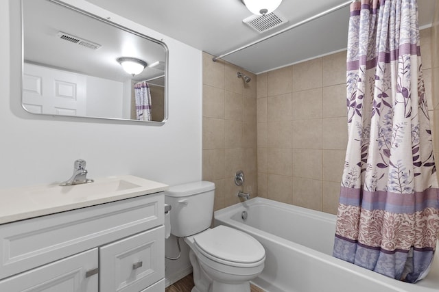 bathroom with shower / bath combo with shower curtain, toilet, visible vents, and vanity