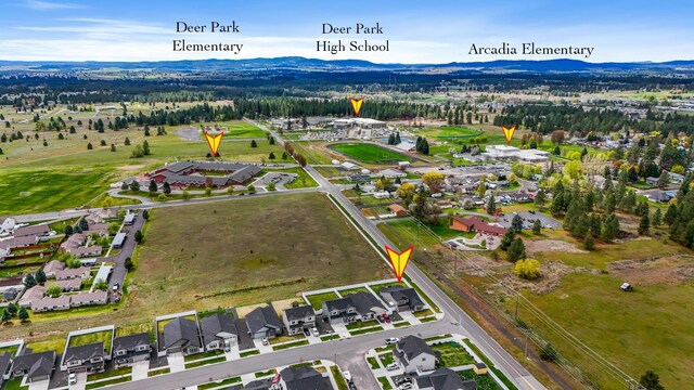 bird's eye view featuring a residential view and a mountain view