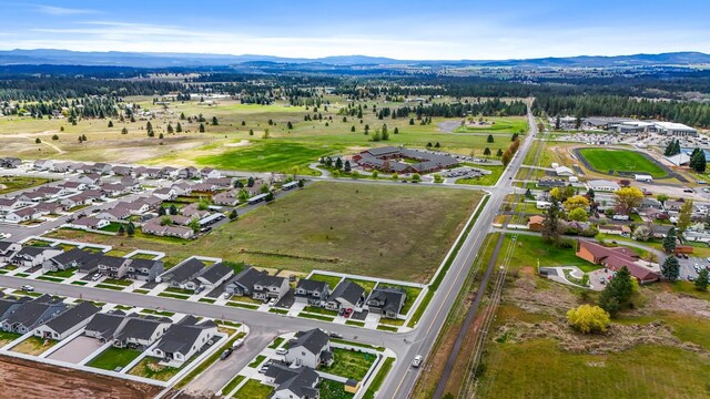aerial view featuring a residential view and a mountain view