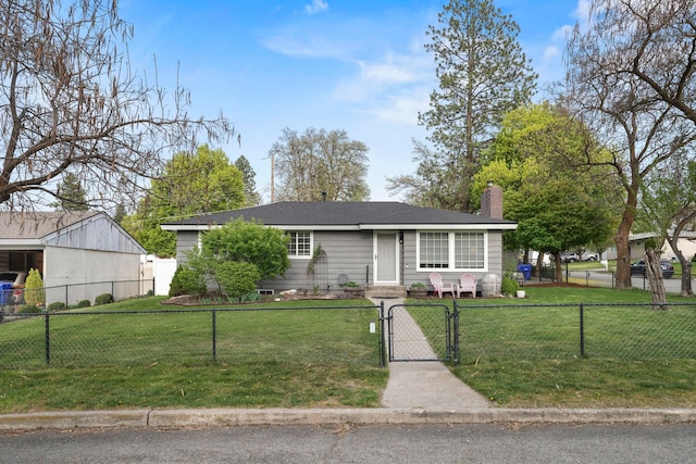 view of front of property featuring a gate, a fenced front yard, a chimney, and a front lawn