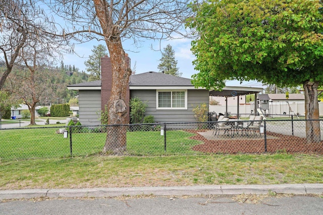 single story home with a chimney, fence private yard, a front yard, and a carport